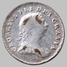 A picture containing object, coin

Description automatically generated