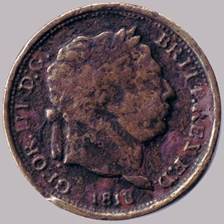 A close-up of a coin

Description automatically generated