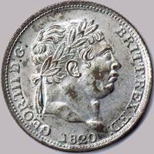 A close-up of a coin

Description automatically generated