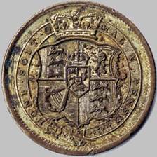 A close-up of a coin

Description automatically generated