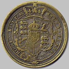 A close-up of a coin

Description automatically generated