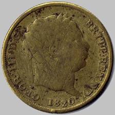 A close-up of a coin

Description automatically generated