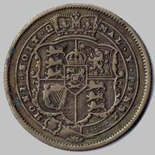 A close-up of a coin

Description automatically generated